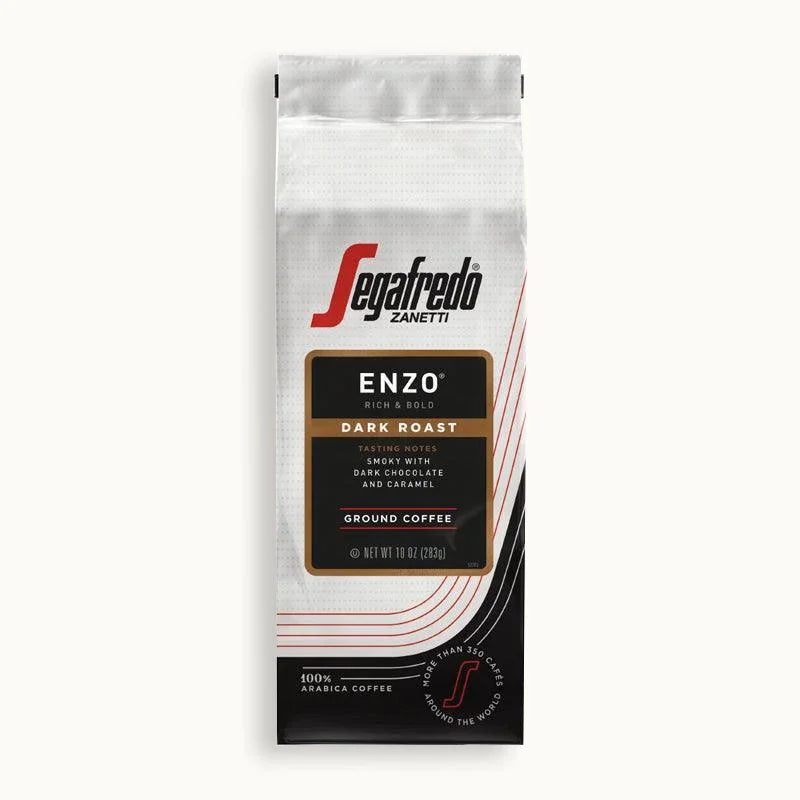 A 10 oz (283 g) bag of Segafredo Zanetti® Coffee Enzo Dark Roast, a South American blend with dark chocolate and caramel notes, in black, white, and gold packaging.