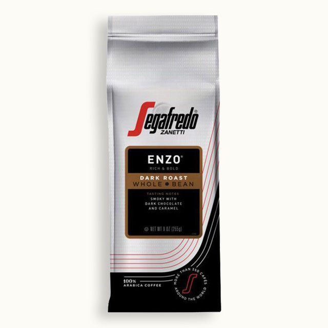 A bag of Segafredo Zanetti® Coffee Enzo Dark Roast Whole Bean Coffee, featuring tasting notes of dark chocolate and caramel. This 8.8 oz (250g) bag holds a versatile blend honoring Italian tradition with 100% Arabica beans.