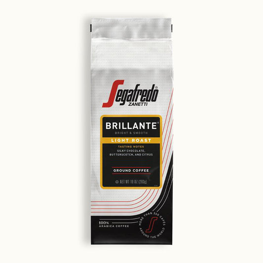 A 10 oz bag of Segafredo Zanetti® Coffee Brillante Light Roast, made from premium Arabica beans with flavors of silky chocolate, butterscotch, and citrus.